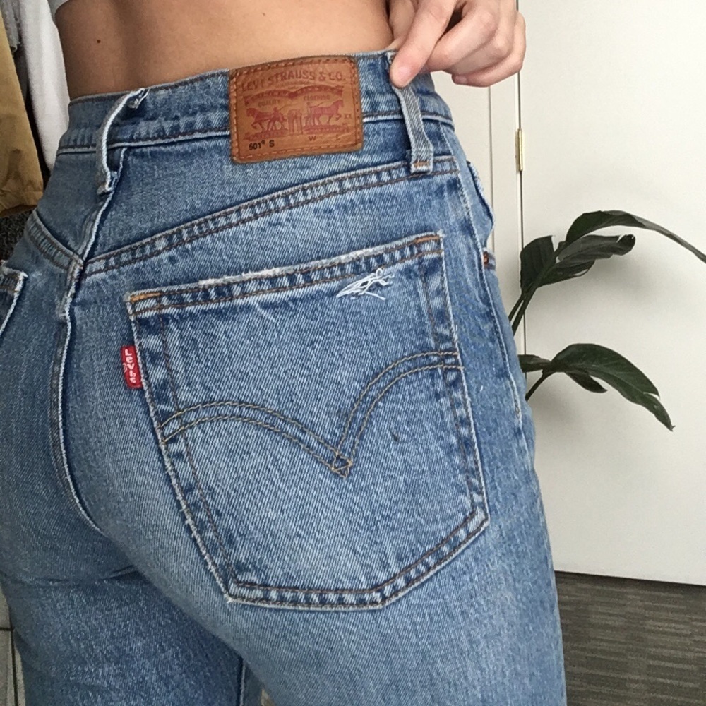 SOLD Levi’s 501 light wash ripped jeans